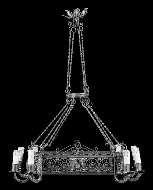 A wrought iron eight light chandelier, early 20th century