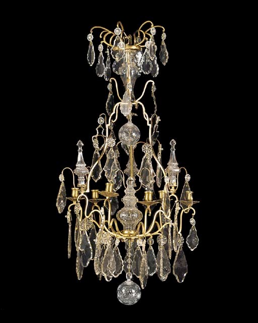 A Louis XV style glass and brass six light chandelier, 20th century