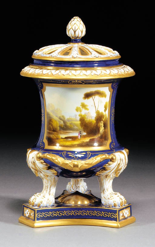 A Royal Worcester dark-blue-ground campana-shaped pot pourri vase and cover
