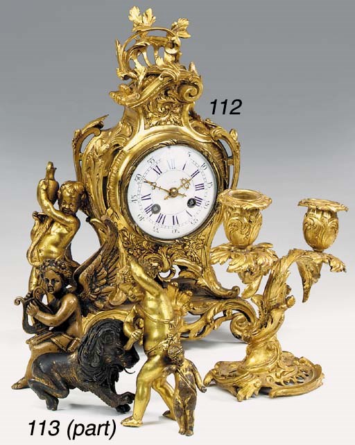 A French gilt bronze striking mantel clock and garniture, late 19th century