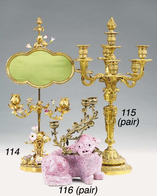 A pair of gilt bronze seven light candelabra, 20th century