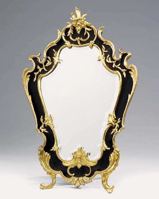 A French gilt bronze and tortoiseshell framed table mirror, late 19th or early 20th century