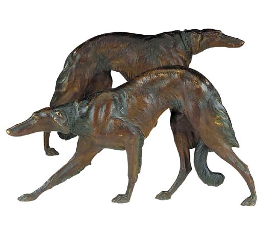 A pair of large bronze Continental models of hunting dogs, late 19th or early 20th century