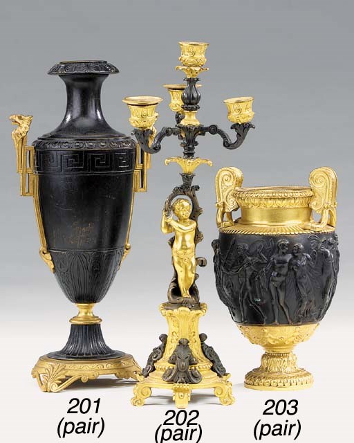 A PAIR OF PATINATED AND GILT BRONZE MODELS OF THE TOWNLEY VASE, LATE 19TH CENTURY