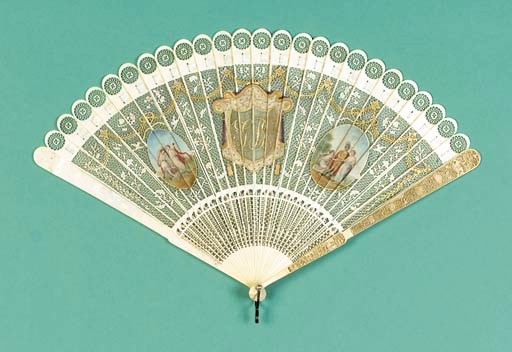 An ivory brise fan carved with inscription GP G[all]as
