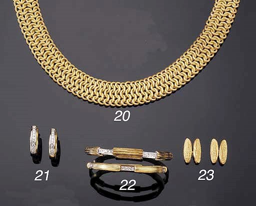 A PAIR OF GOLD AND DIAMOND BANGLES