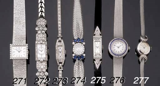 PATEK PHILIPPE. AN 18K WHITE GOLD AND DIAMOND LADY'S WRIST WATCH