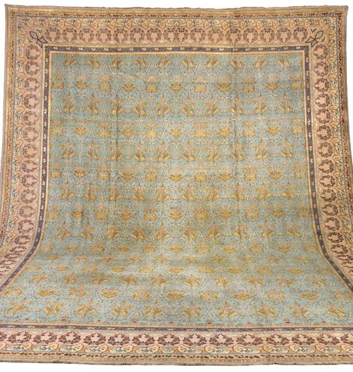 A HEREKE CARPET WITH SILK HIGHLIGHTS