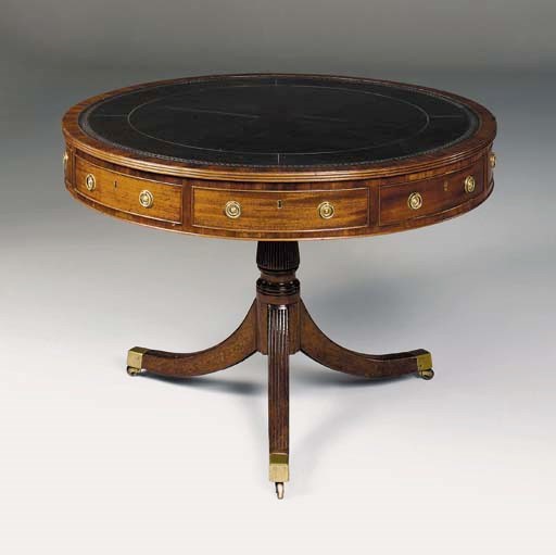 A REGENCY MAHOGANY DRUM TABLE