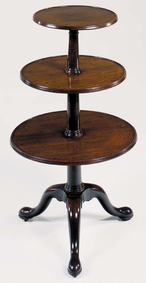 AN EARLY GEORGE III MAHOGANY THREE-TIER TRIPOD DUMB-WAITER