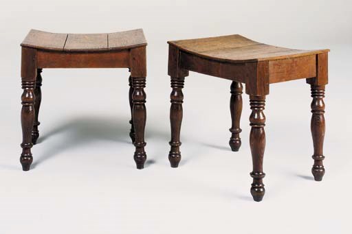 A PAIR OF REGENCY OAK DISH-SEATED STOOLS