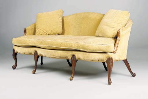 A MAHOGANY SERPENTINE SOFA