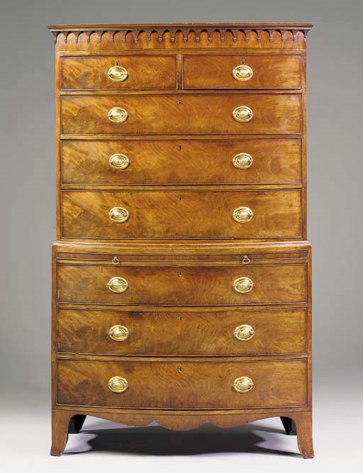 A GEORGE III MAHOGANY BOWFRONT TALLBOY
