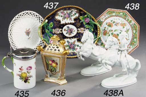 Two Vienna porcelain models of Lipizzaner stallions and a Staffordshire pottery model of a hunter on horseback