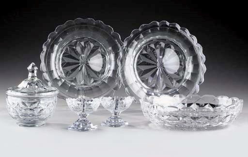 A cut-glass bowl and a cover; five cut-glass finger bowls; a cut-glass oval bowl or épergne dish; a pair of cut-glass dishes; a pair of cut-glass oval salts
