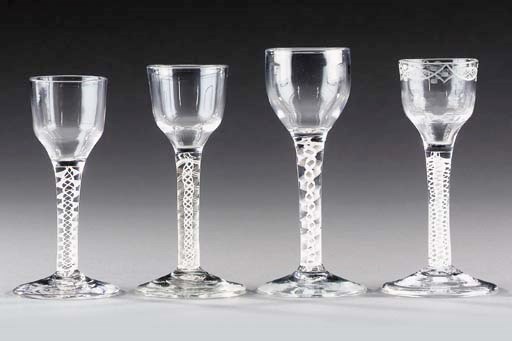 Four wine-glasses with opaque-twist stems