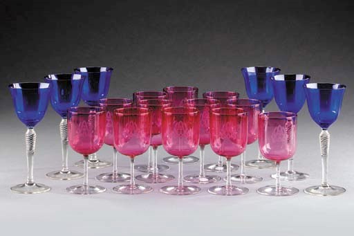 Six wine-glasses with flared faceted blue bowls; twelve pale ruby wine-glasses; and five engraved punch-cups