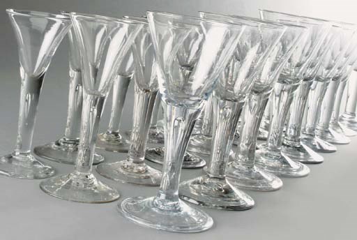 Five large drawn-trumpet wine-glasses