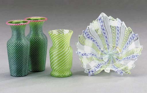 A pair of Clichy small green and white latticinio shouldered vases; another, similar; and a Murano blue, green and white latticino leaf-shaped dish