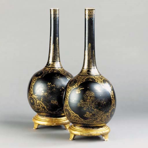A MATCHED PAIR OF CHINESE 'MIRROR BLACK' AND GILT GLOBULAR BOTTLE VASES