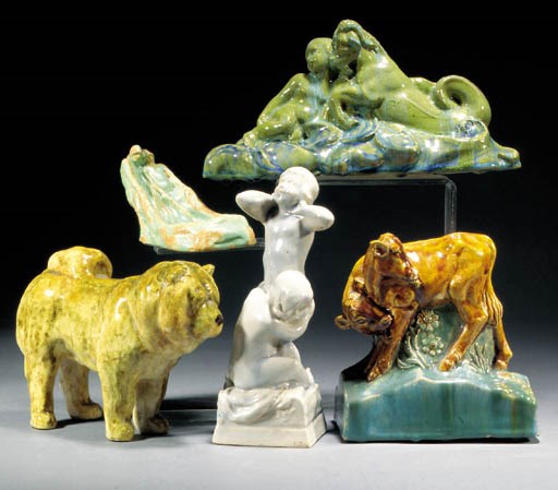 A pottery figure of a husky