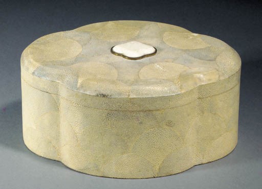 A shagreen, fossil limestone, brass and stained wood box