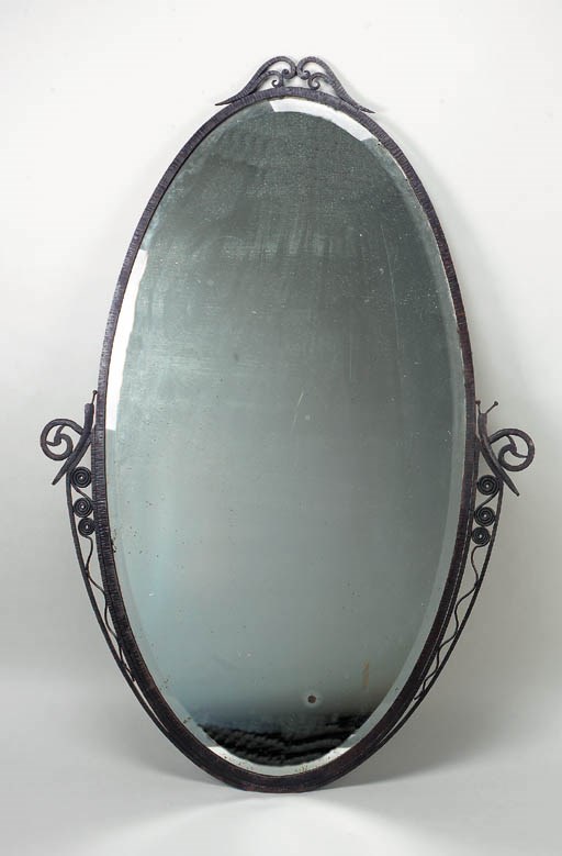 A French wrought-iron mirror