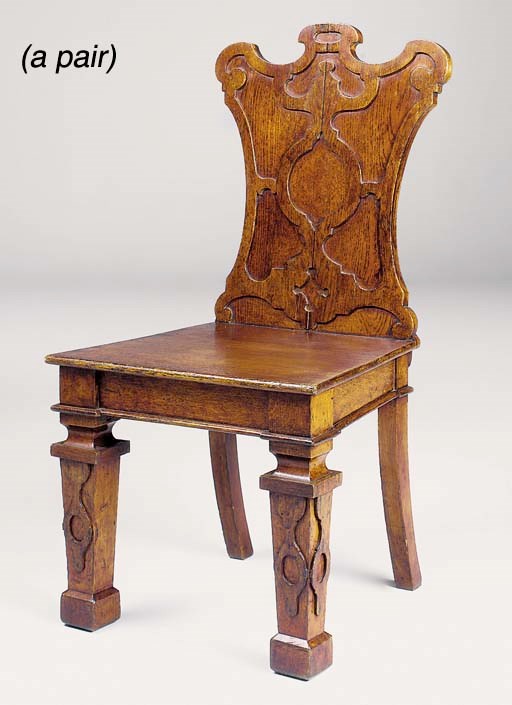 A PAIR OF EARLY-VICTORIAN OAK HALL CHAIRS