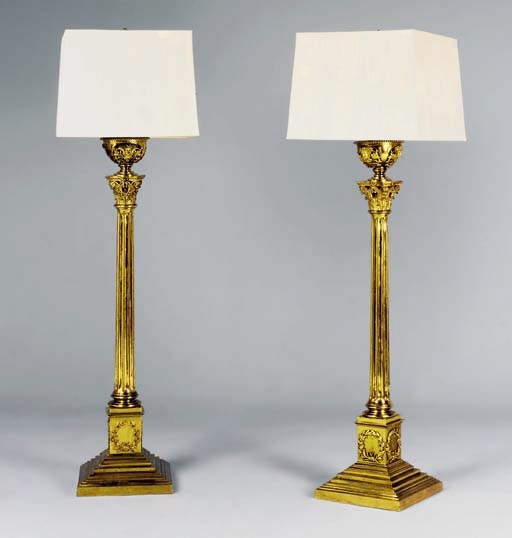 A PAIR OF VICTORIAN LAQUERED-BRASS COLUMN STANDARD LAMPS