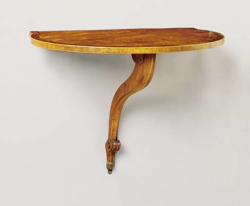 A GEORGE III SATINWOOD CONSOLE TABLE