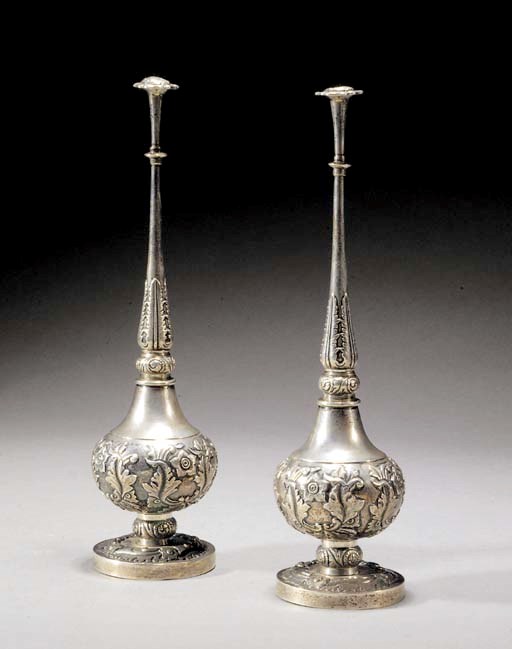 A pair of Indian silver rosewater sprinklers
19th Century