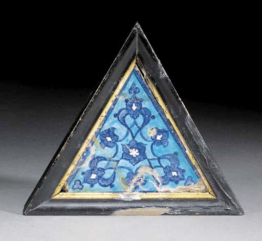 An Iznik triangular pottery tile
16th century