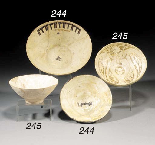 A Persian footed pottery bowl