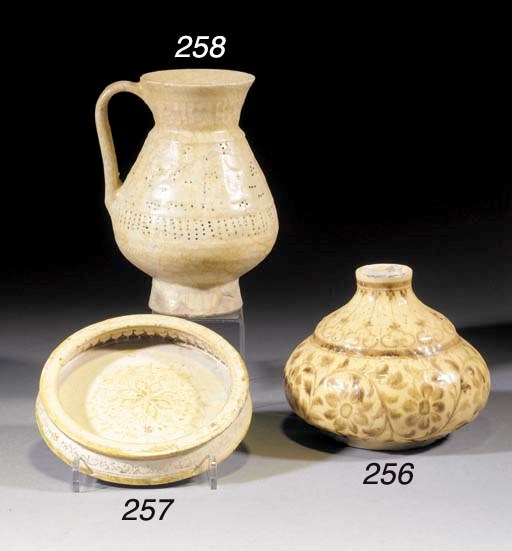 A Kashan lustre shallow dish
12th/13th century