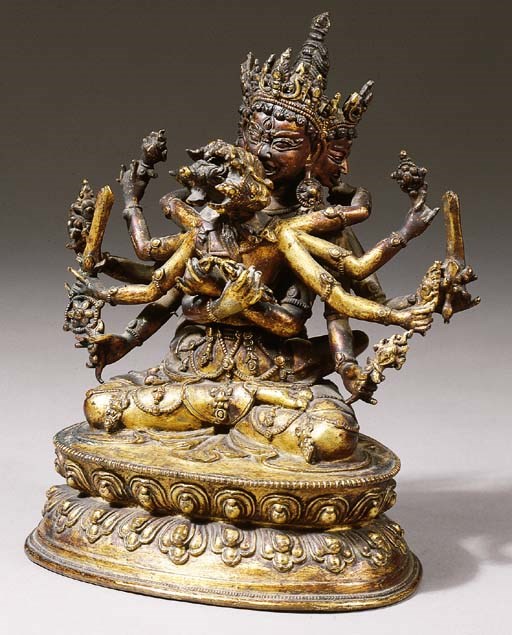 a tibetan gilt-bronze figure of guhyasamaja