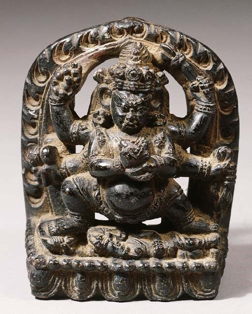 a rare tibetan black stone figure of sadbhujamahakala