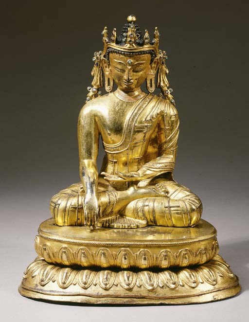 a tibetan gilt-bronze figure of akshobhya