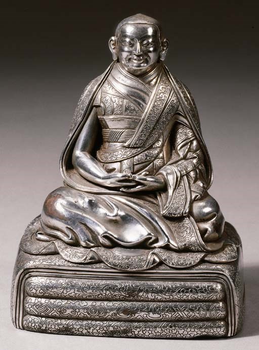 a fine tibetan silver figure of perhaps a sa.skya.pa lama