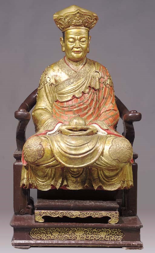 a rare sino-tibetan polychrome wood figure of a bka'.brgyud.pa lama