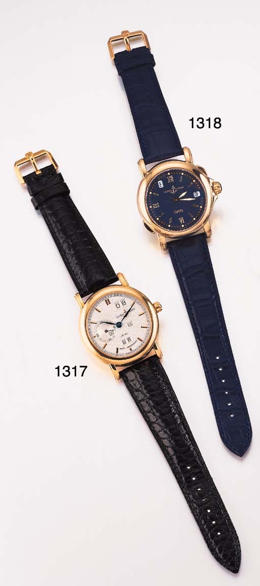 ULYSSE NARDIN. AN 18K GOLD SELF-WINDING DUAL TIME WRISTWATCH WITH SWEEP CENTRE SECONDS AND DATE