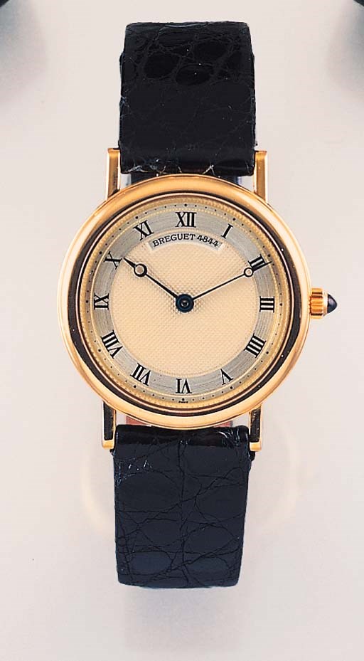BREGUET. AN 18K GOLD WRISTWATCH