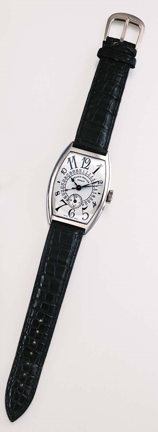 FRANCK MULLER. AN 18K WHITE GOLD SELF-WINDING TONNEAU-SHAPED WRISTWATCH WITH SWEEP CENTRE SECONDS AND DATE