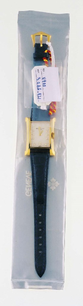 PATEK PHILIPPE. A FINE LADY'S 18K GOLD AND DIAMOND-SET RECTANGULAR WRISTWATCH