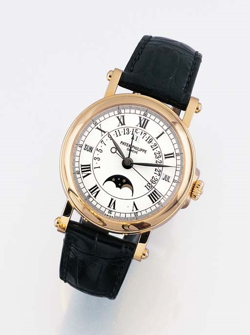 PATEK PHILIPPE. A FINE 18K PINK GOLD SELF-WINDING PERPETUAL CALENDAR WRISTWATCH WITH SWEEP CENTRE SECONDS AND PHASES OF THE MOON