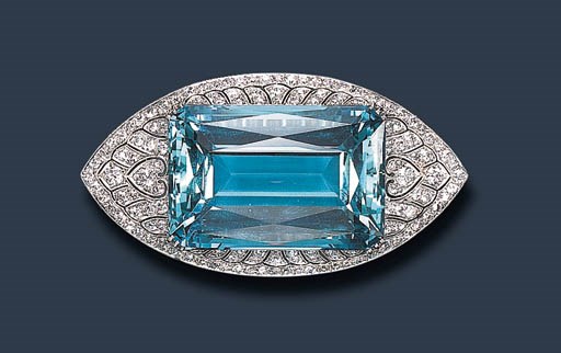 AN ATTRACTIVE ART DECO AQUAMARINE AND DIAMOND BROOCH, BY GILLOT & CO.