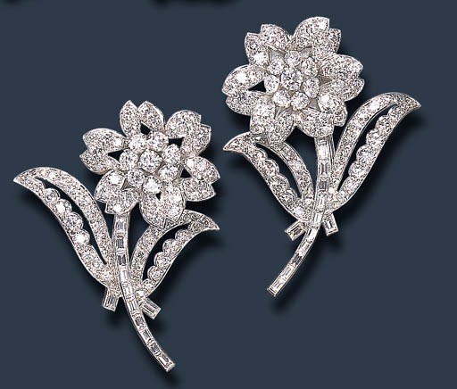 A PAIR OF DIAMOND BROOCHES, BY GARRARD