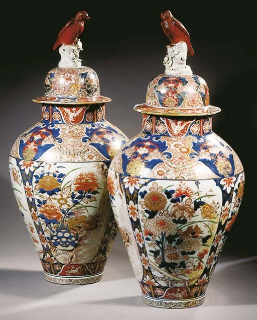 A large pair of Imari baluster jars and covers