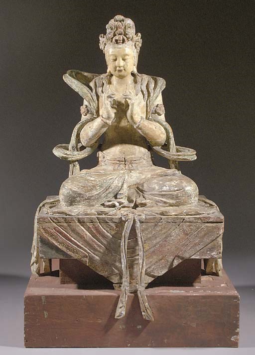 A polychrome wood figure of Guanyin