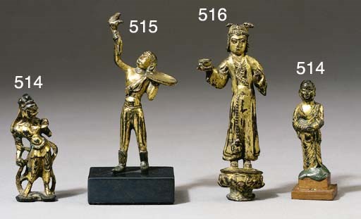 A gilt bronze figure of a foreign priest