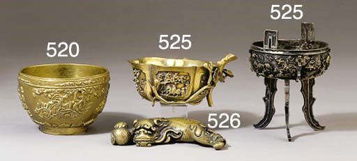 A bronze lion weight